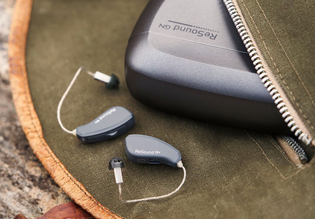 Hearing aids in a case